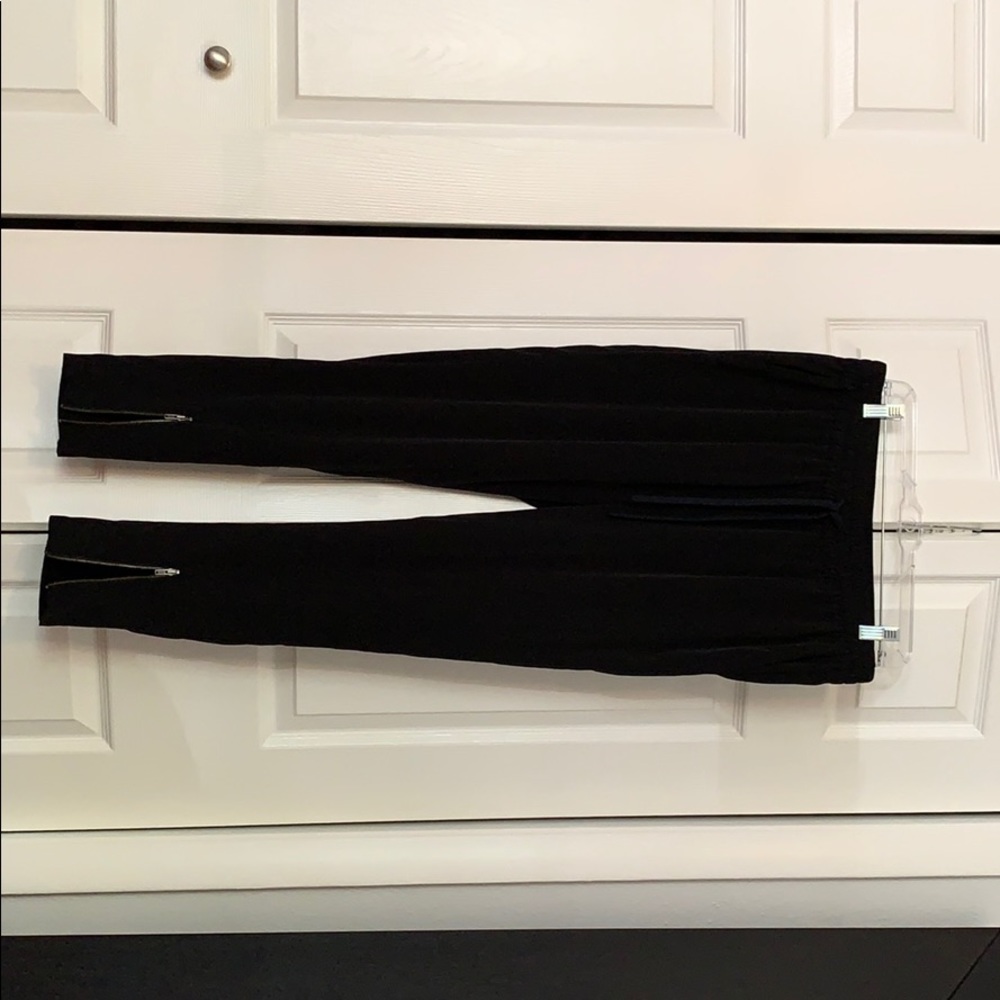 Black zip-up pants
